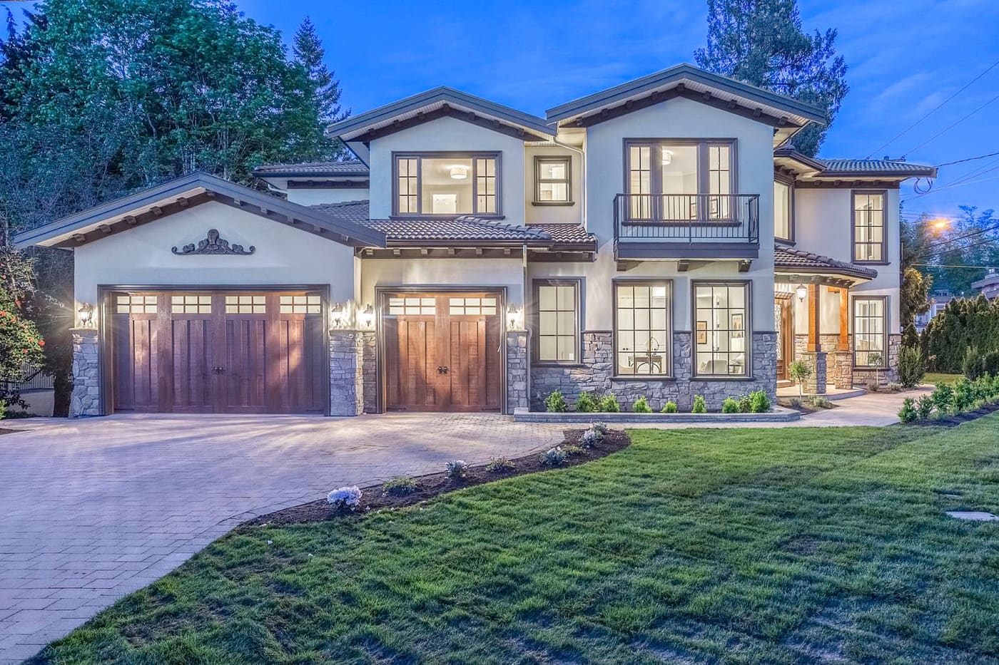 Home exterior photographed at night